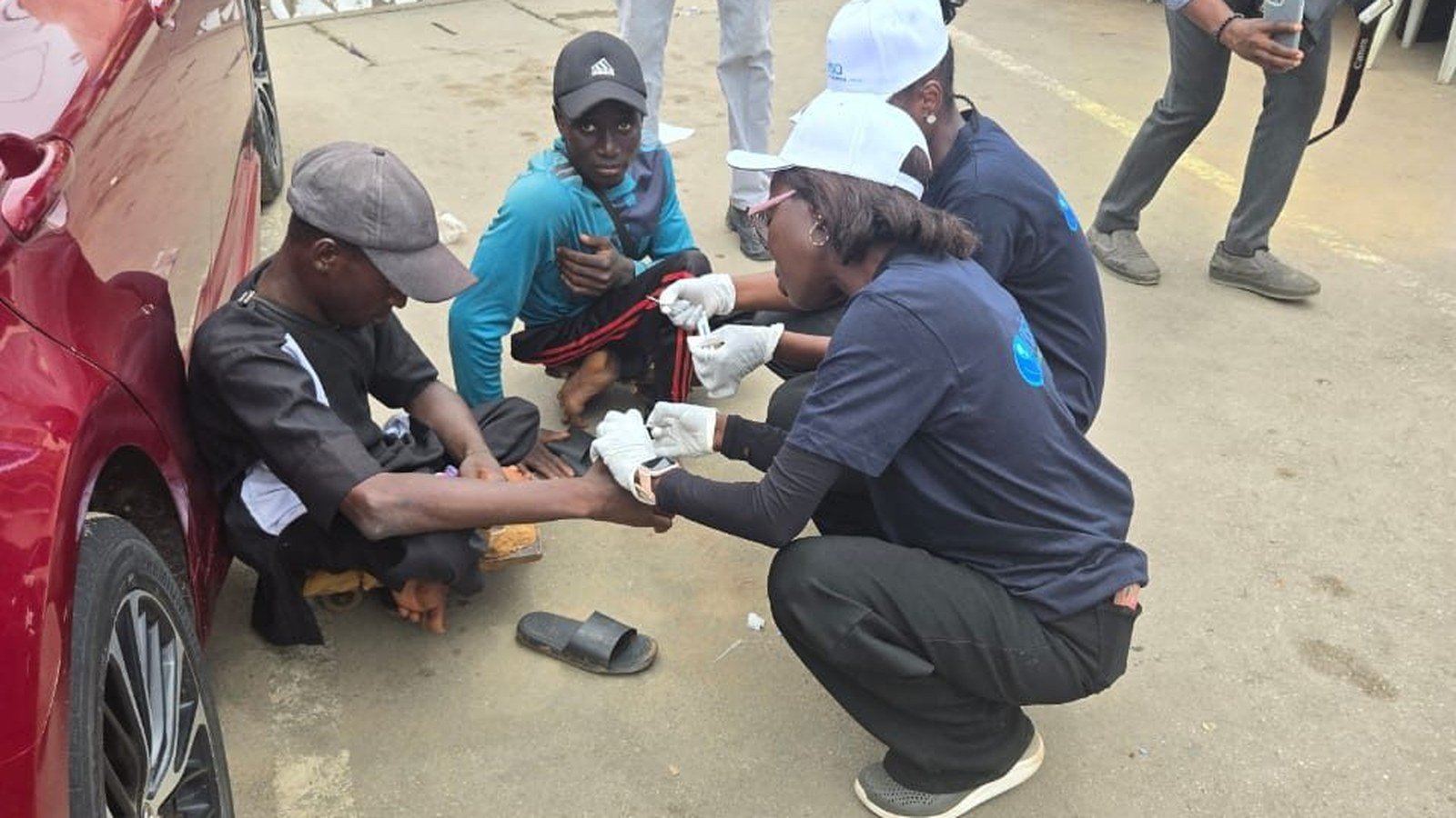 A health worker takes a blood sample from a resident during the World Hepatitis Day outreach in Garki, Abuja